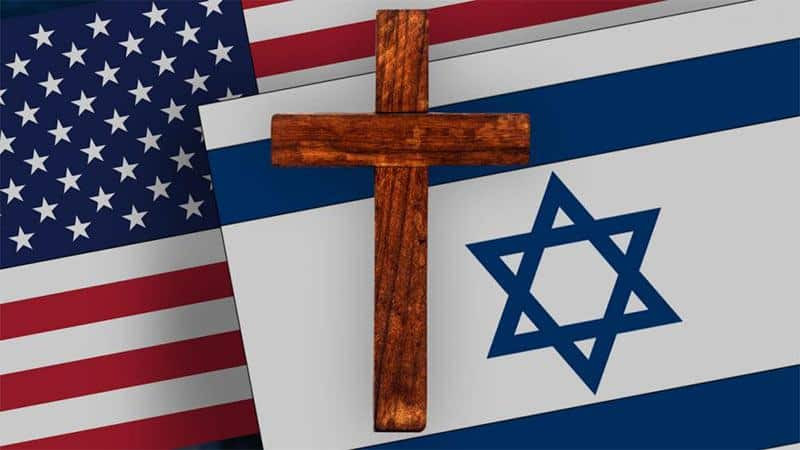 Crucifix on top of the flags of Isreal and the USA